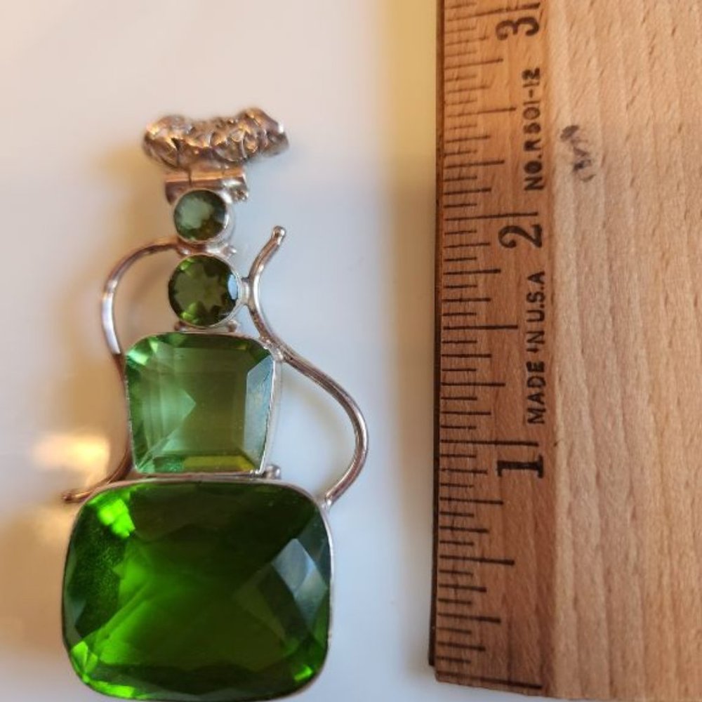 PERIDOT 4-STONE 925 SILVER PENDANT WITH SCROLL DETAIL